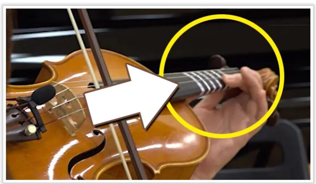 指板シールが貼られたヴァイオリンの画像